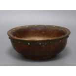 A Tibetan wood, copper, coral and turquoise mounted bowl diameter 18cm