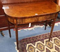 A Regency mahogany D-shaped folding top card table W.90cm