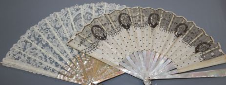 A Brussels lace fan with mother of pearl sticks, in Duvelleroy fitted box and another fan with