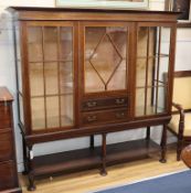 An Edwardian inlaid mahogany bookcase W.165cm