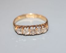 A George V 18ct gold and five stone diamond half hoop ring, size N/O.