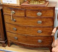 A Regency mahogany bow-fronted chest fitted two short drawers and three long drawers on bracket feet