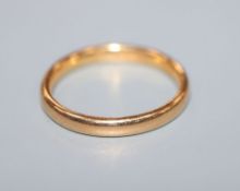 A 22ct yellow gold wedding ring,