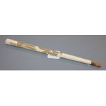 An ivory parasol handle