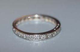 An 18ct white gold and diamond set full eternity ring, size N.