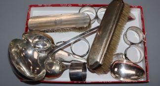 Five silver napkin rings, a Danish white metal spoon, two silver mounted brushes and minor plated