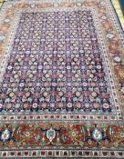 A North West Persian blue ground carpet 287 x 210cm