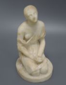 A 19th century alabaster figure of a kneeling woman height 21cm