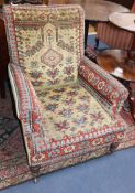 A late Victorian Kelim upholstered armchair
