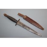 J. Nowill & Sons, A commando fighting knife, ribbed grip and 17cm spear point blade with leather