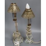 A pair of early 20th century prismatic cut glass table lamps, with metal shades