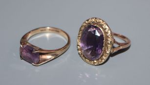 Two 9ct and amethyst set dress rings.