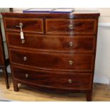 A late Regency mahogany crossbanded and inlaid bowfront chest of drawers W.102cm