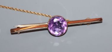 A 9ct and amethyst bar brooch, 51mm.