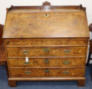 An 18th century Dutch marquetry inlaid oak and walnut bureau W.108cm