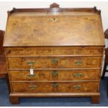 An 18th century Dutch marquetry inlaid oak and walnut bureau W.108cm