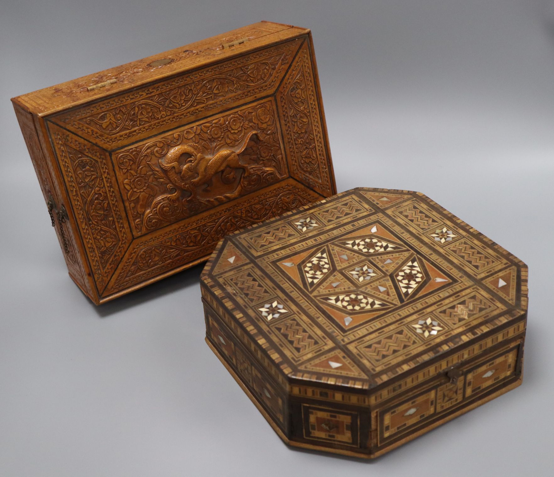 A sandalwood box and a mother of pearl inlaid octagonal box