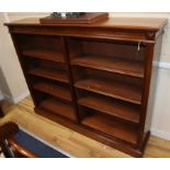 An Edwardian walnut open bookcase W.152cm