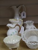 A Belleek 'Millennium' strawberry basket and five other items of Belleek, comprising a scroll-