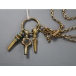 An early 20th century 9ct chain, hung with three assorted watch keys.