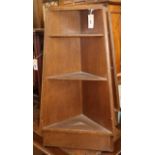 A pair of small oak corner units W.86cm