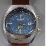 A 1970's? steel Memostar alarm manual wind wrist watch, on associated leather strap.