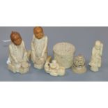 A Canton ivory box, three Japanese ivory or bone figures and an ivory netsuke