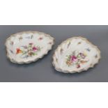 A pair of Dresden leaf shaped dishes length 24.5cm