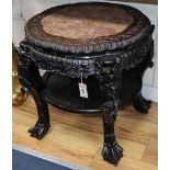 A Chinese hardwood and marble top jardiniere stand H.58cm