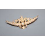 A yellow gold and split pearl set foliate crescent brooch, 54mm.