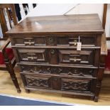 A 17th century oak geometric moulded chest of drawers W.90cm