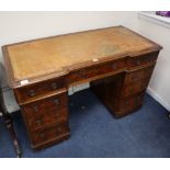 A Victorian walnut pedestal desk W.122cm