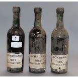 Three bottles of Cockburns vintage port 1967