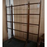 A Sheraton period mahogany folding towel rail