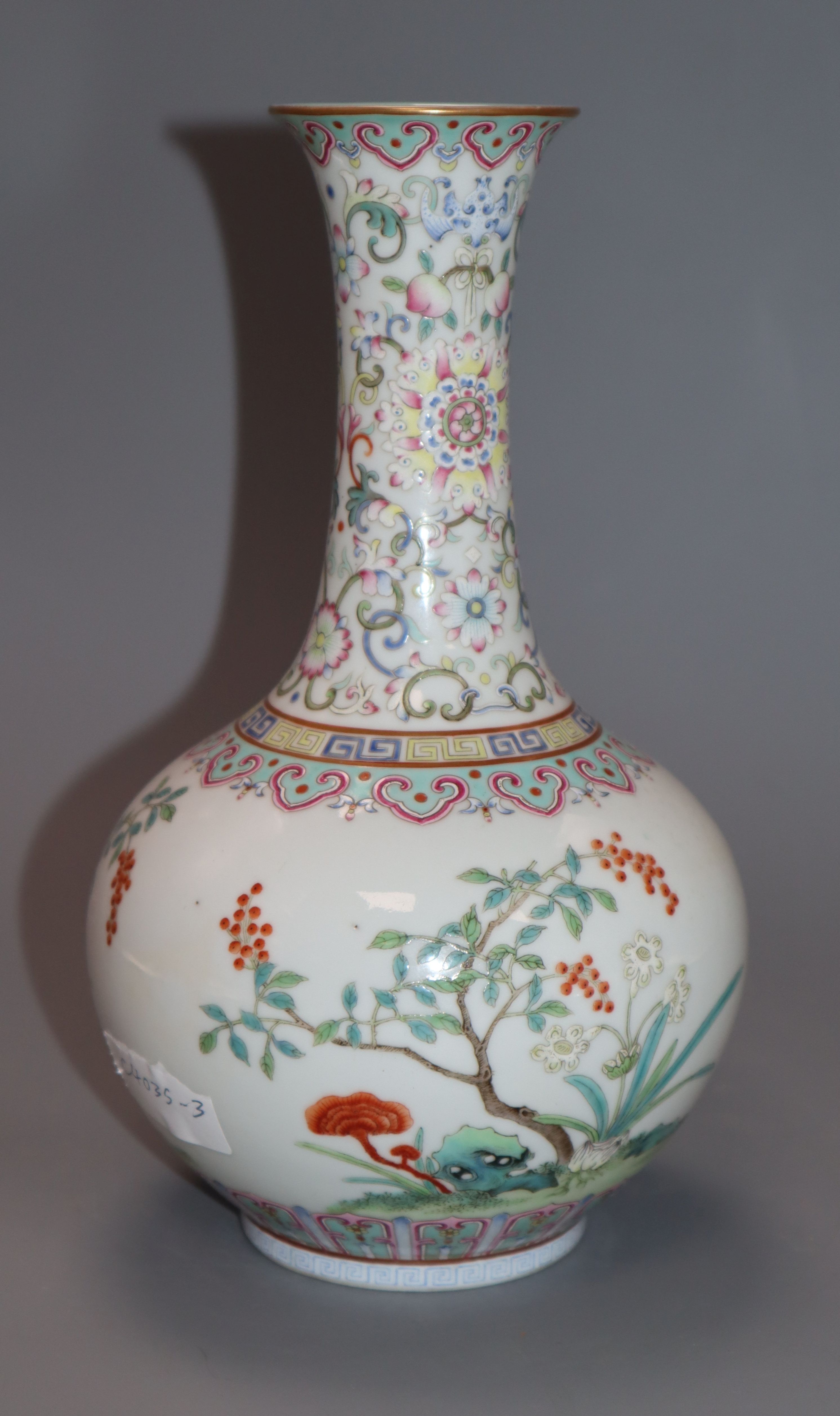 A Chinese famille rose bottle vase, a four character mark, possibly republic period height 23cm