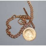 An 18ct gold curb-link watch chain with 1902 gold sovereign fob, gross 55.2 grams.