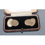 A pair of 9ct gold oval cufflinks, 10 grams.
