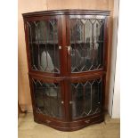 A 1920's mahogany bowfront display cabinet W.125cm