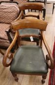 A pair of Regency mahogany scroll elbow chairs, with scroll arms