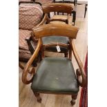 A pair of Regency mahogany scroll elbow chairs, with scroll arms