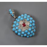 A yellow and white metal, turquoise, ruby and diamond encrusted heart shaped pendant, overall 37mm.