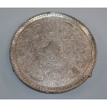 A George III silver salver, by Crouch & Hannam, London, 1777, with later embossed decoration, on