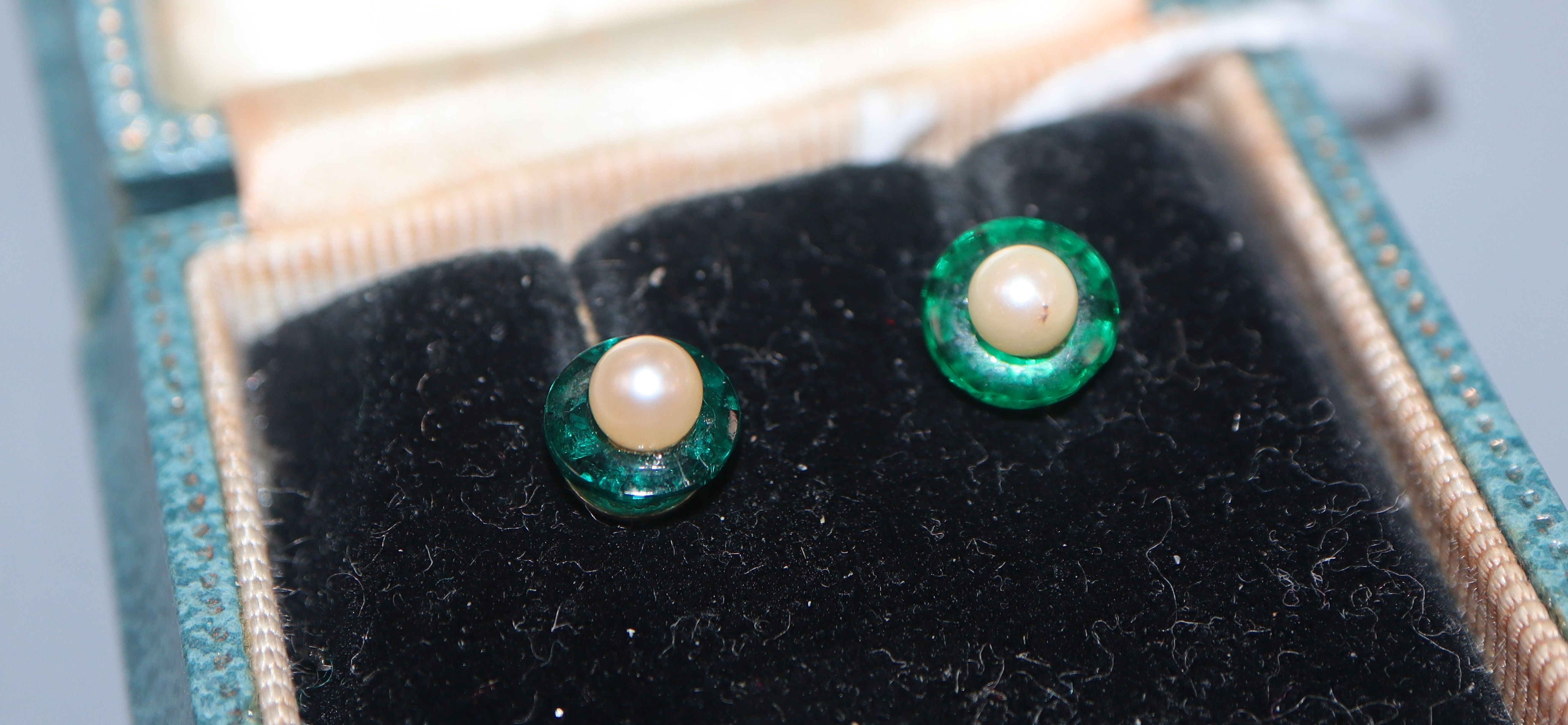 A cased pair of cultured pearl pearl and green paste? ear studs.