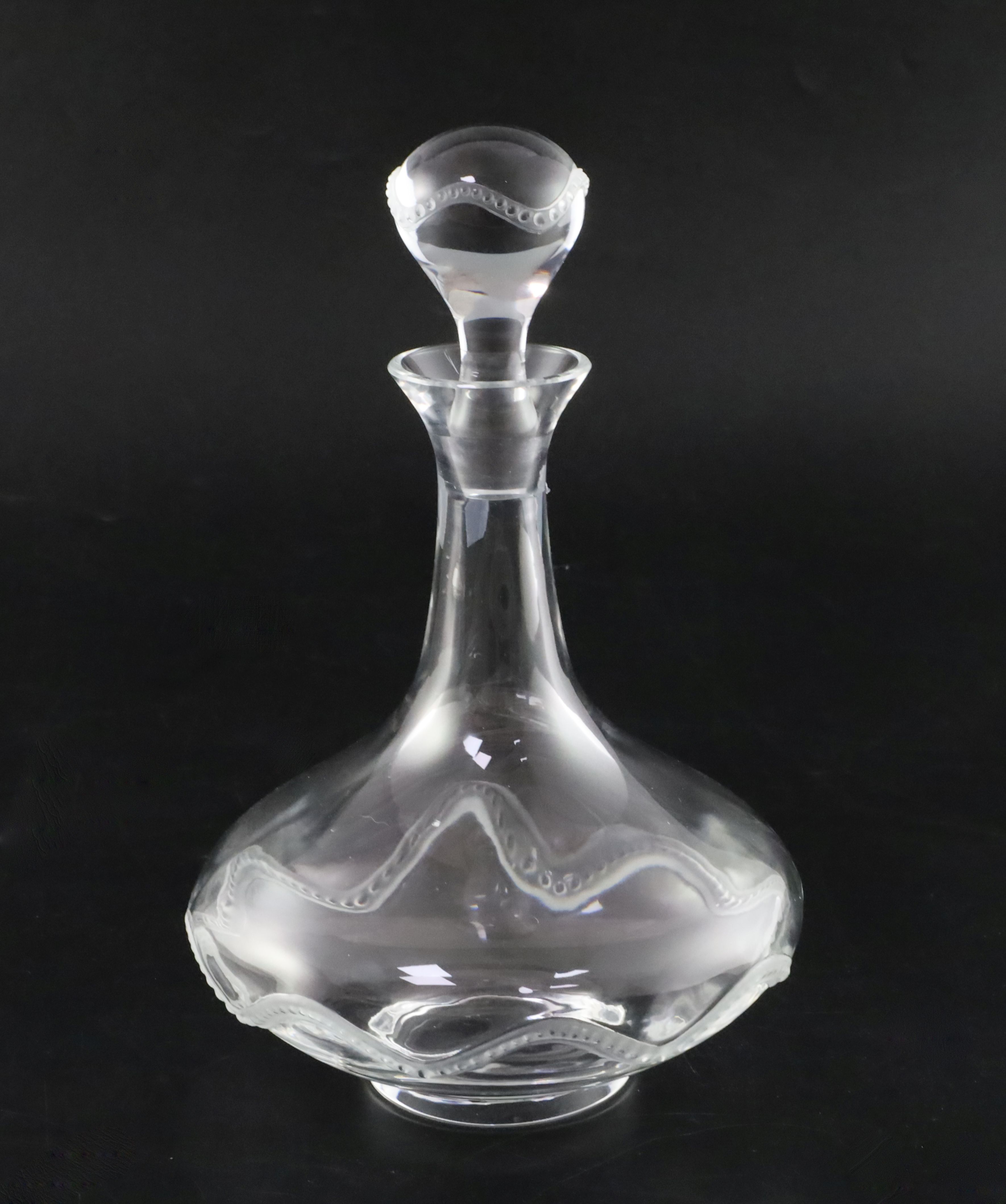 A Lalique Crystal 'Champs de Mars' decanter and stopper applied with frosted wavy beaded bands,