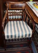 A set of eight Regency brass inlaid mahogany dining chairs (two with arms)