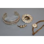 A Scottish silver and citrine brooch, a white metal bangle and a Tissot wrist watch and a 9ct gold