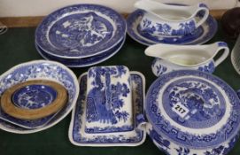 A quantity of 'Old Willow' pattern ceramics