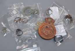 A small collection of antiquities, comprising a Roman bronze finger ring (30th Legion), a silver