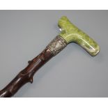 A hardstone walking cane with silver harp design