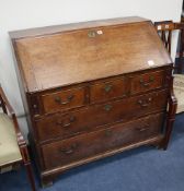 A George III oak bureau W.103cm